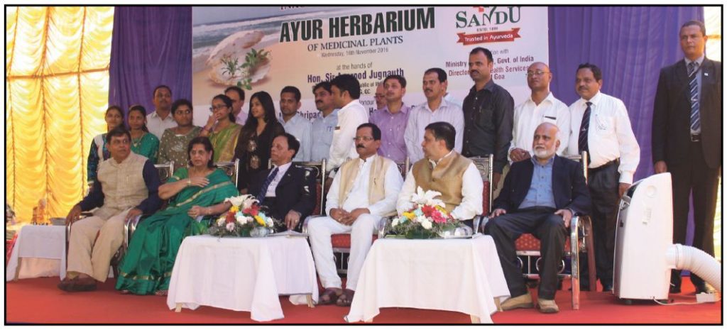 IN LOVE WITH AYURVEDA! Visiting chief guest Mauritian prime minister Sir Anerood Jugnauth after the inauguration of an Ayurveda herbarium at the Sandu Pharmaceuticals plant at Pilerne industrial estate on November 16, 2016. Group pic also has AYUSH minister Shripad Naik, director of Health Services Dr Sanjeev Dalvi, Shashank and Umesh Sandu with staff. Ayurveda medicines are popular in Mauritius and First Lady Sarojini Devi confided that ‘neem goli’ is useful for diabetes. (Pic by Tara Narayan)